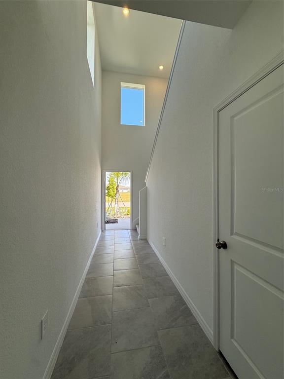 11795 Cloverly Lane Punta Gorda, FL 33955 - Photo 14 of 36 a view of hallway with wooden floor