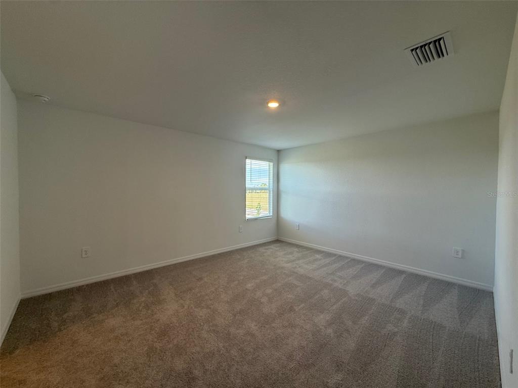 11795 Cloverly Lane Punta Gorda, FL 33955 - Photo 19 of 36 a view of an empty room and window