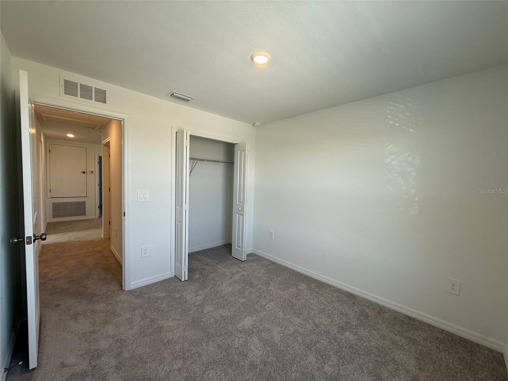 11795 Cloverly Lane Punta Gorda, FL 33955 - Photo 30 of 36 an empty room with a bathroom