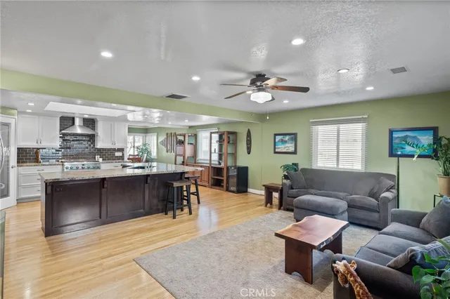 a view of a dining area with furniture and wooden floor