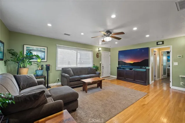 a kitchen with granite countertop a stove and a sink