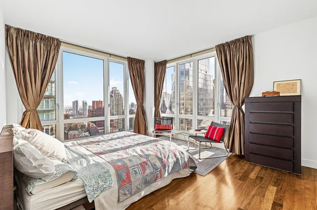a kitchen with stainless steel appliances granite countertop a stove and a refrigerator
