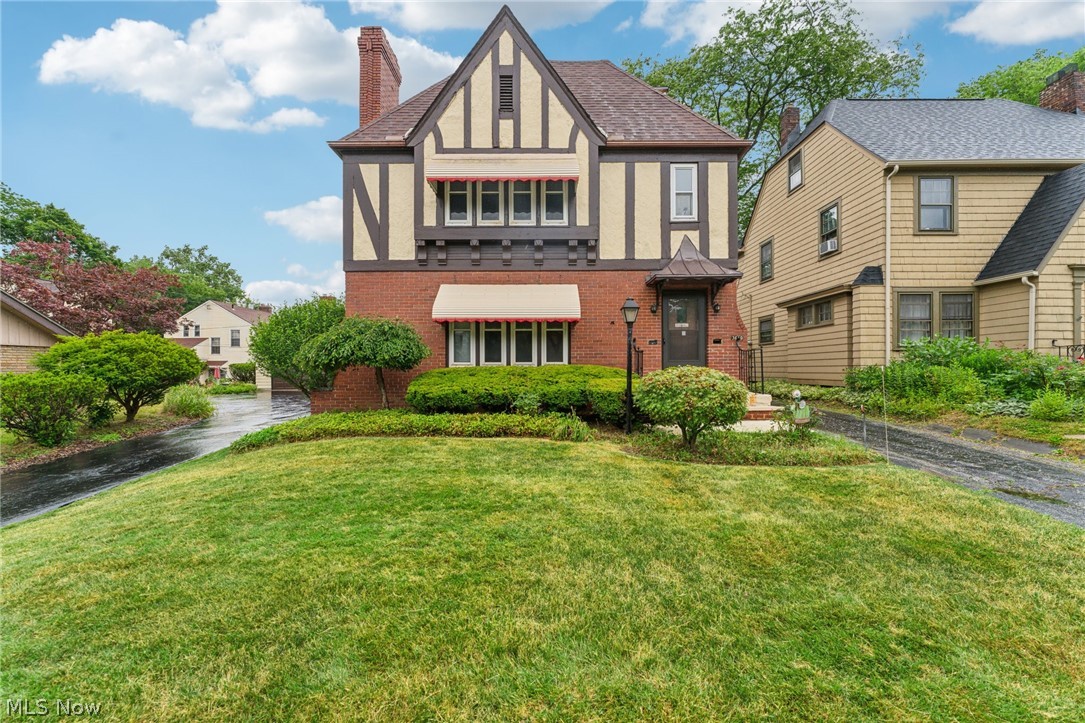 3619 Strathavon Road Cleveland, OH 44120 - Photo 1 of 49 English style home featuring a front yard