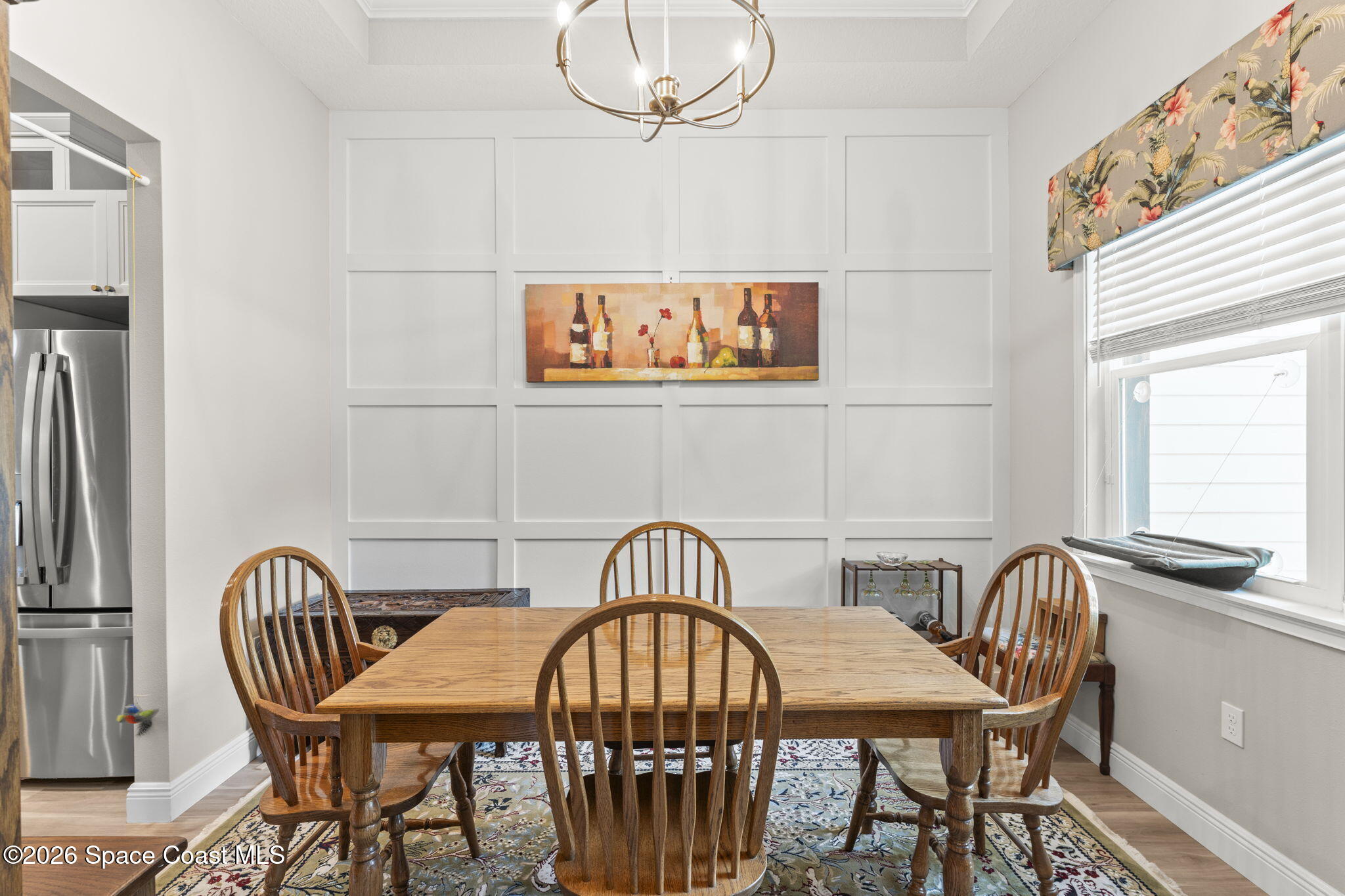 1740 Ford Road Mims, FL 32754 - Photo 6 of 43 a view of a dining room with furniture and chandelier