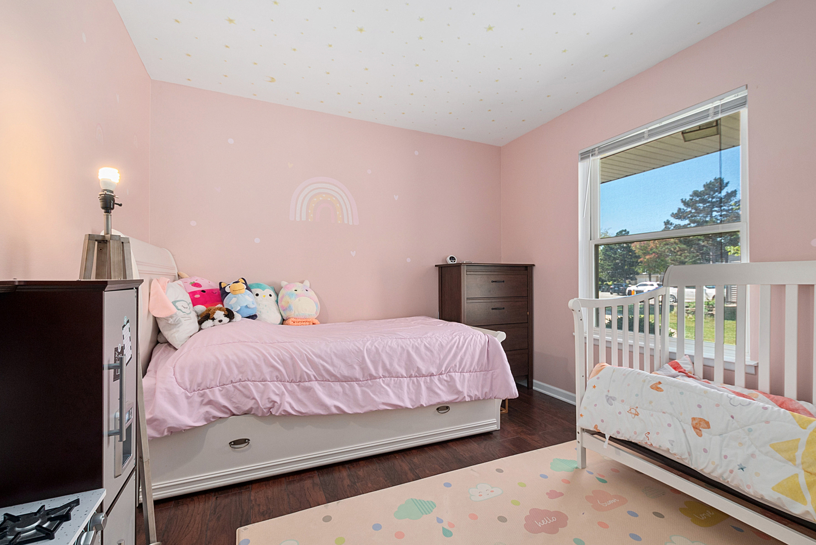 8 Warwick Court Streamwood, IL 60107 - Photo 8 of 14 a bedroom with a bed and a window