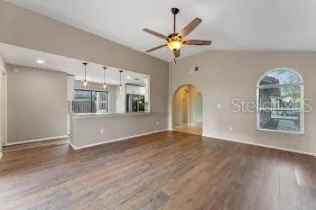 a view of a kitchen with a sink and window