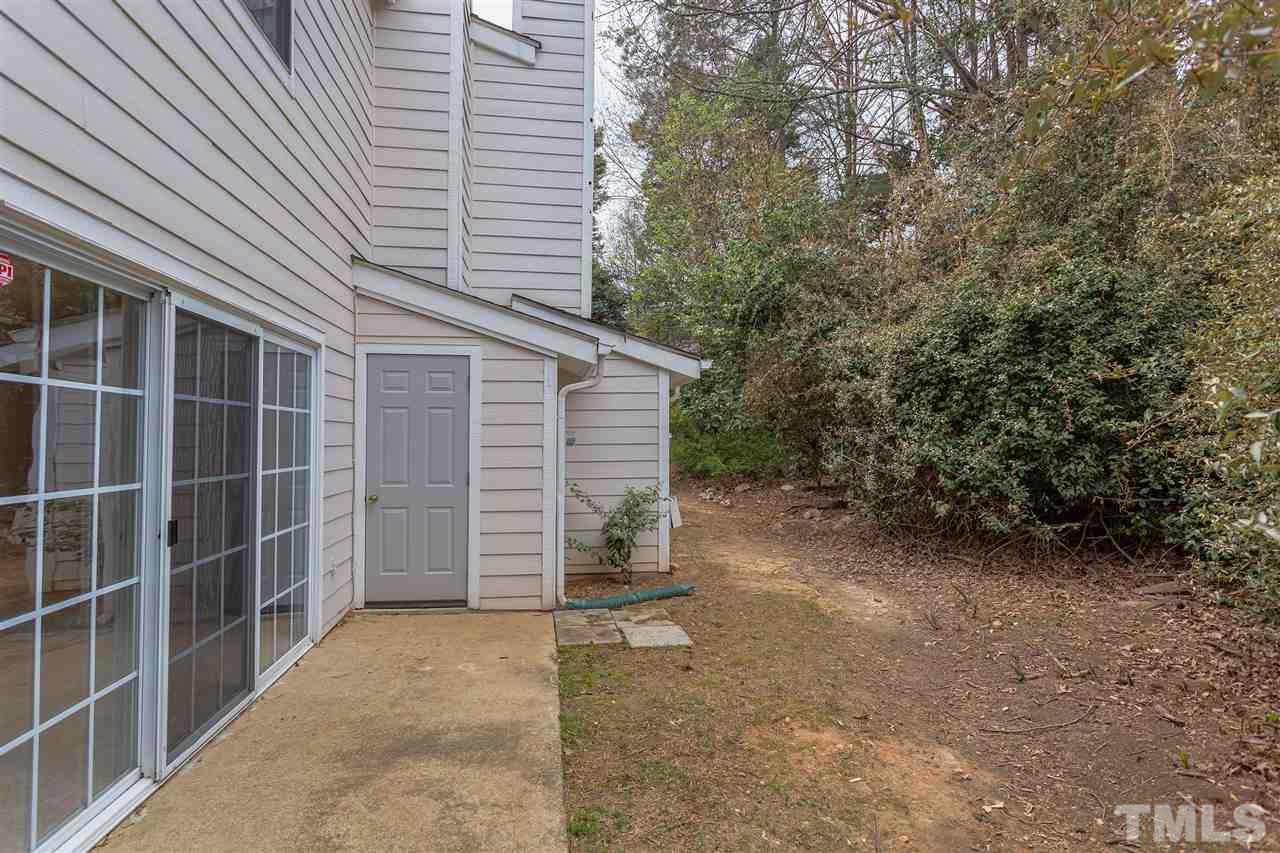 7812 Falcon Rest Circle Raleigh, NC 27615 - Photo 24 of 26 a view of a house with a yard
