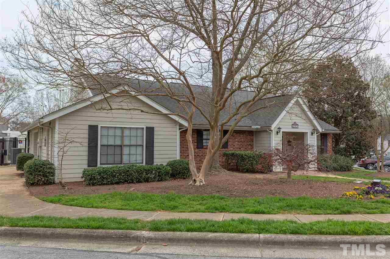 7812 Falcon Rest Circle Raleigh, NC 27615 - Photo 26 of 26 a front view of a house with a yard