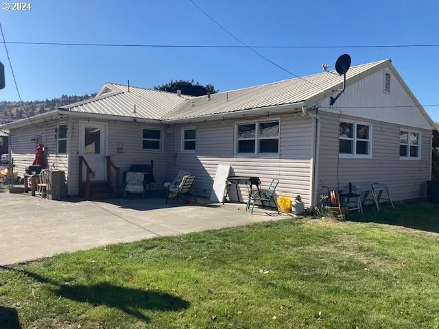 a front view of a house with patio
