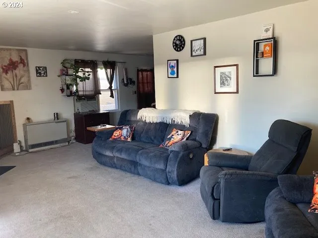 a living room with furniture and a couch