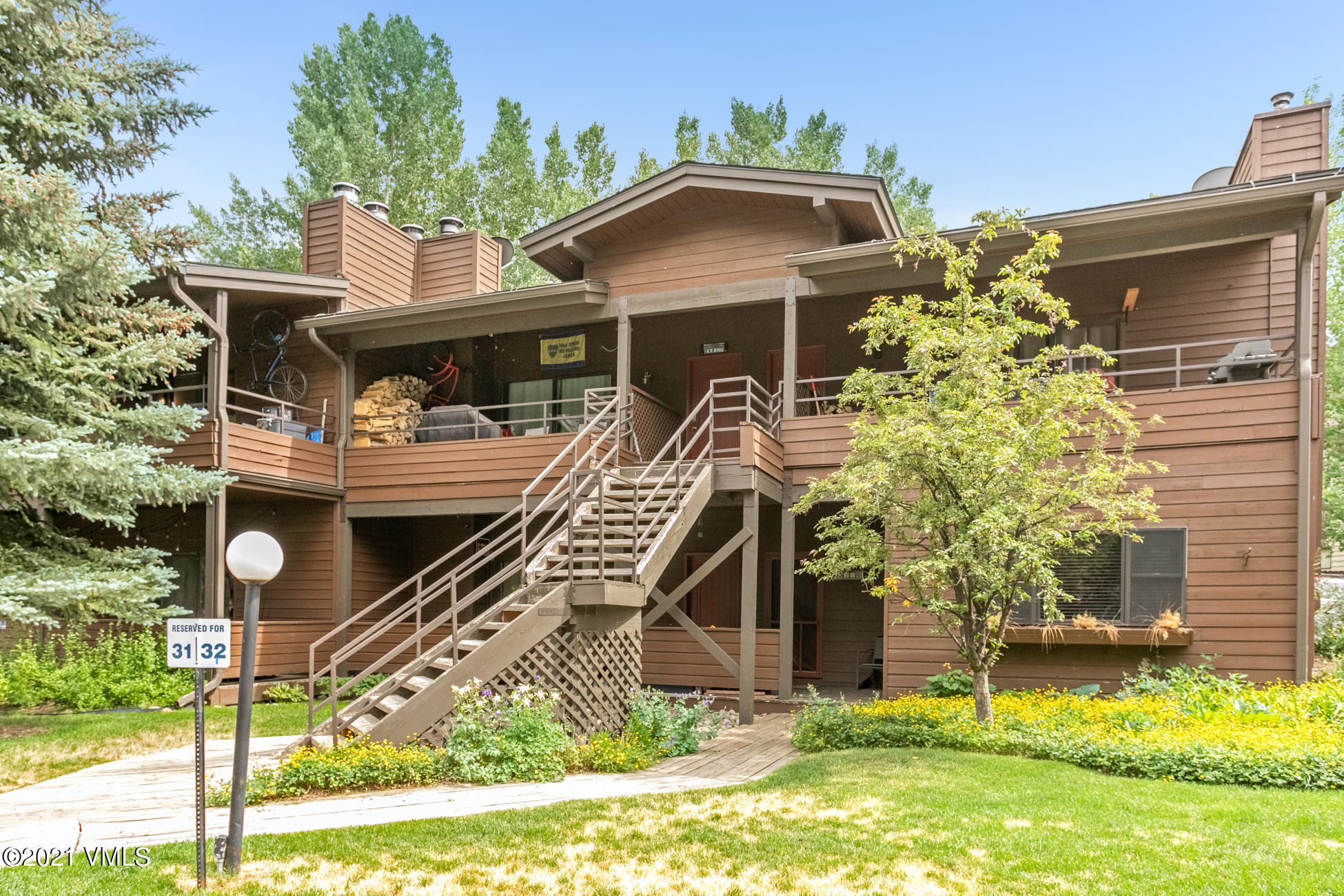 280 Gopher Road, Unit 29 Avon, CO 81620 - Photo 14 of 14 a front view of a house with a yard