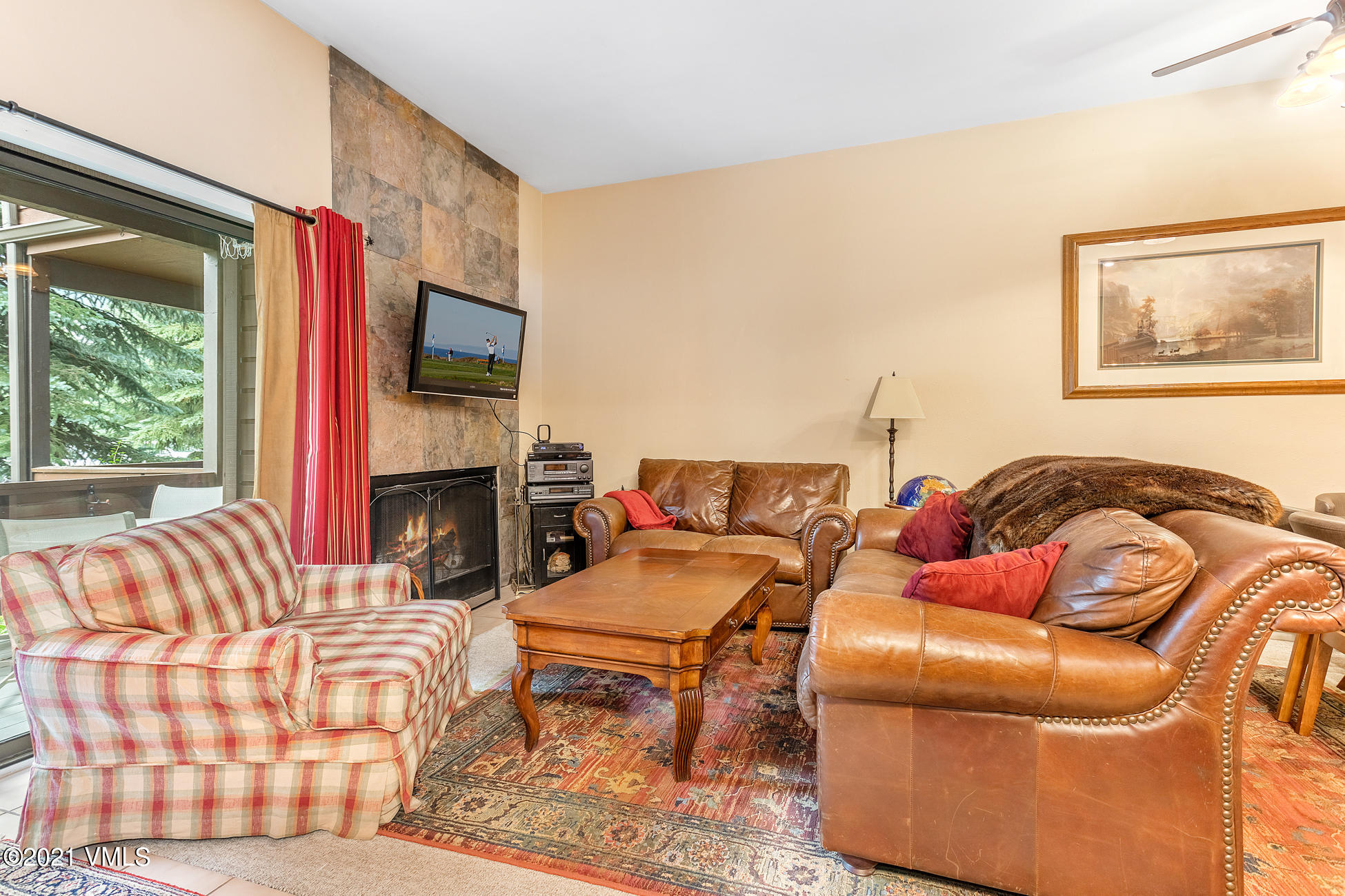 280 Gopher Road, Unit 29 Avon, CO 81620 - Photo 3 of 14 a living room with furniture fireplace and flat screen tv