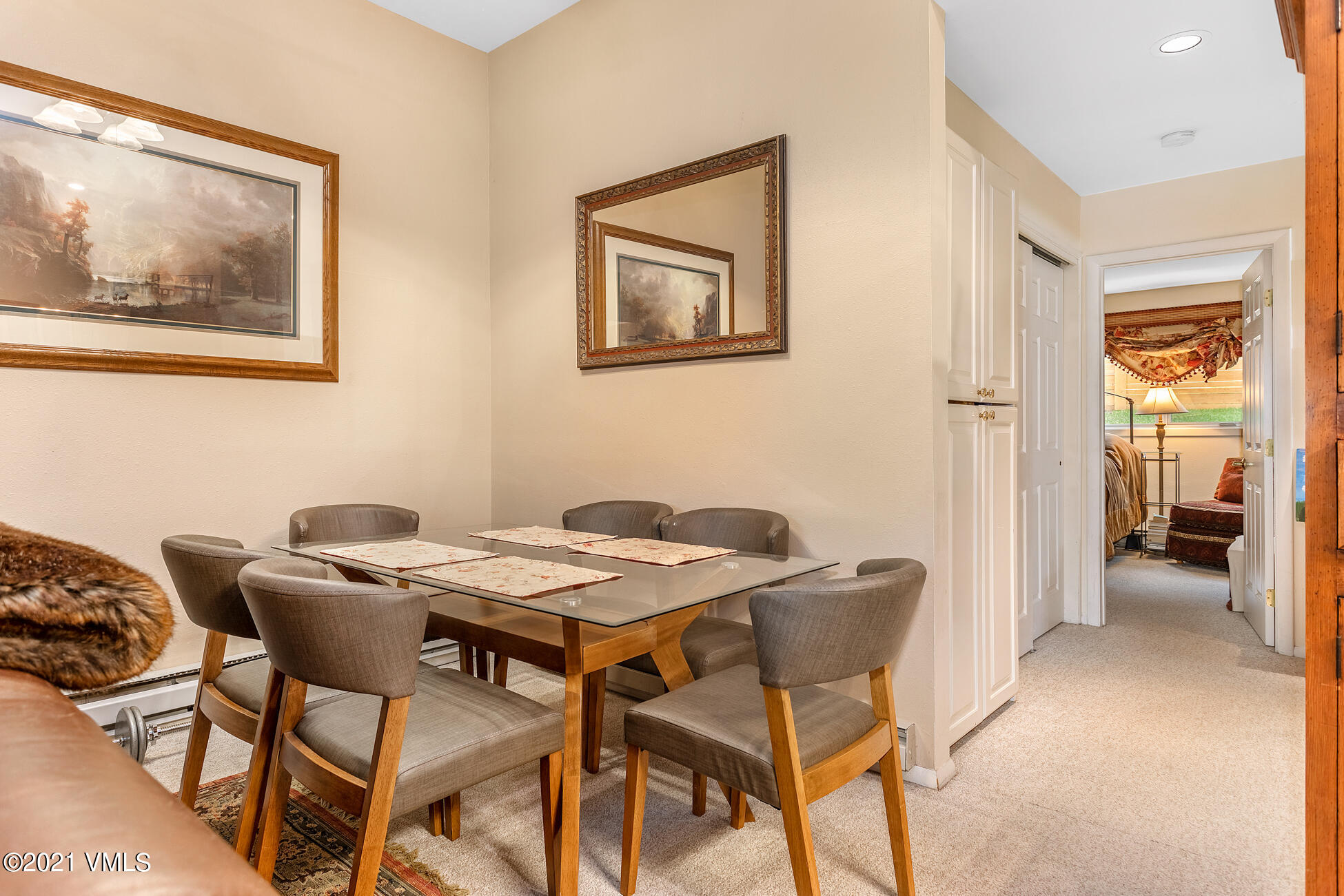 280 Gopher Road, Unit 29 Avon, CO 81620 - Photo 5 of 14 a view of a dining room with furniture and a chandelier