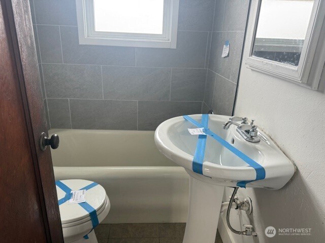 306 South 6th Street Satsop, WA 98541 - Photo 11 of 13 a bathroom with a sink and a bathtub