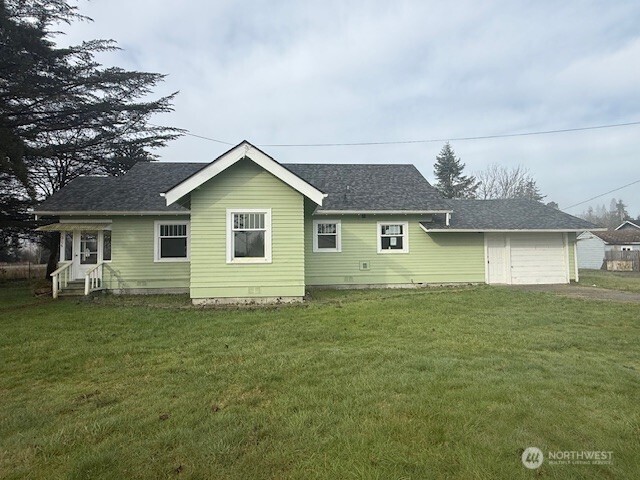 306 South 6th Street Satsop, WA 98541 - Photo 3 of 13 a front view of a house with a garden