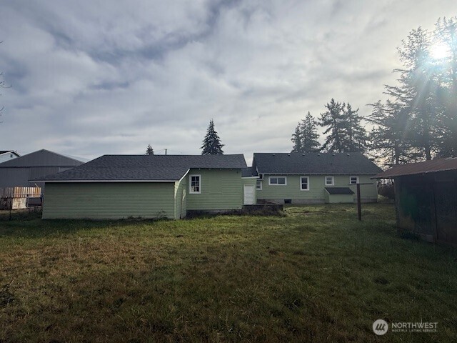 306 South 6th Street Satsop, WA 98541 - Photo 4 of 13 a view of a house with a yard