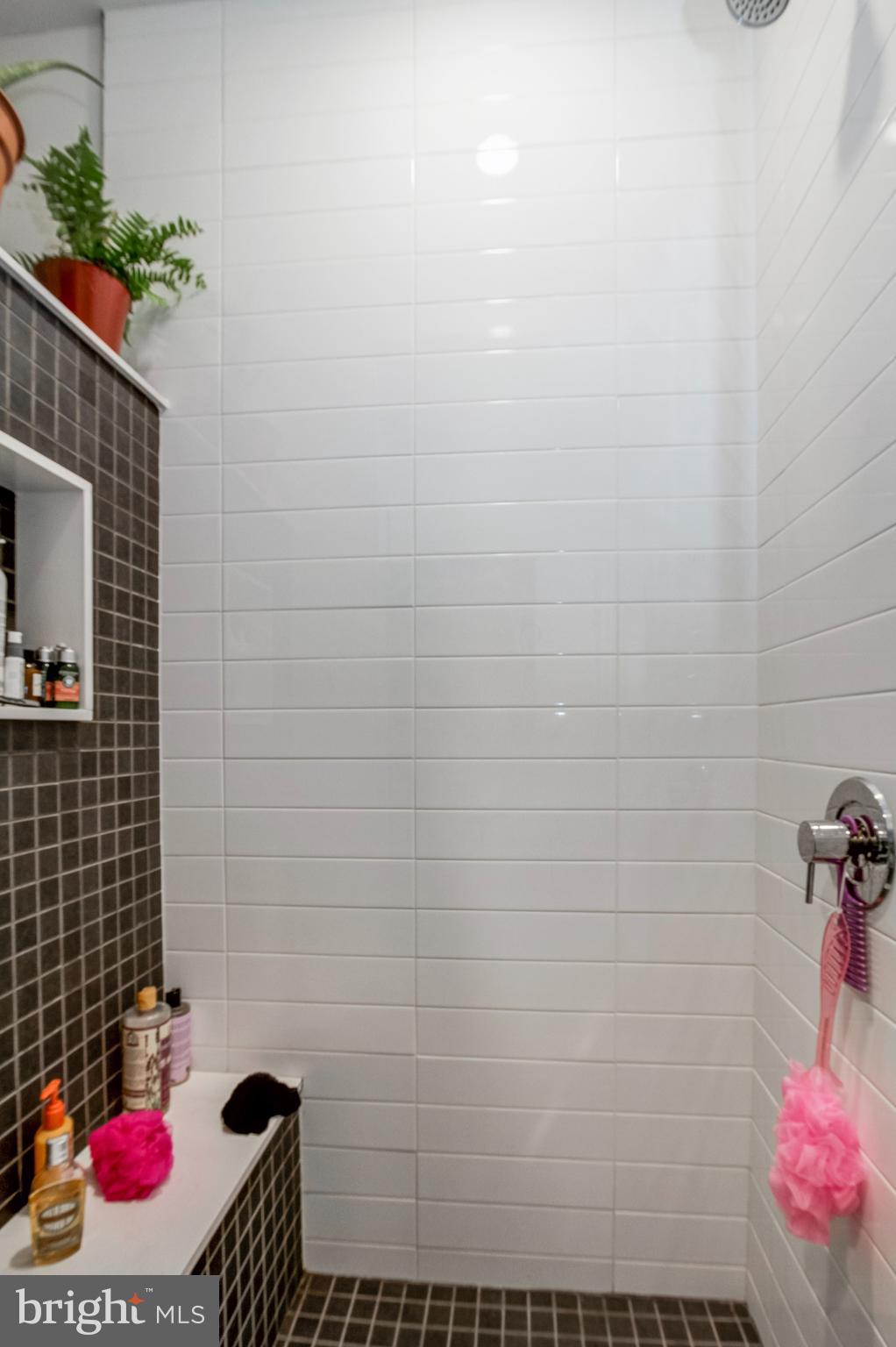 1942 North Front Street, Unit 206 Philadelphia, PA 19122 - Photo 11 of 14 a bathroom with a toilet and shower