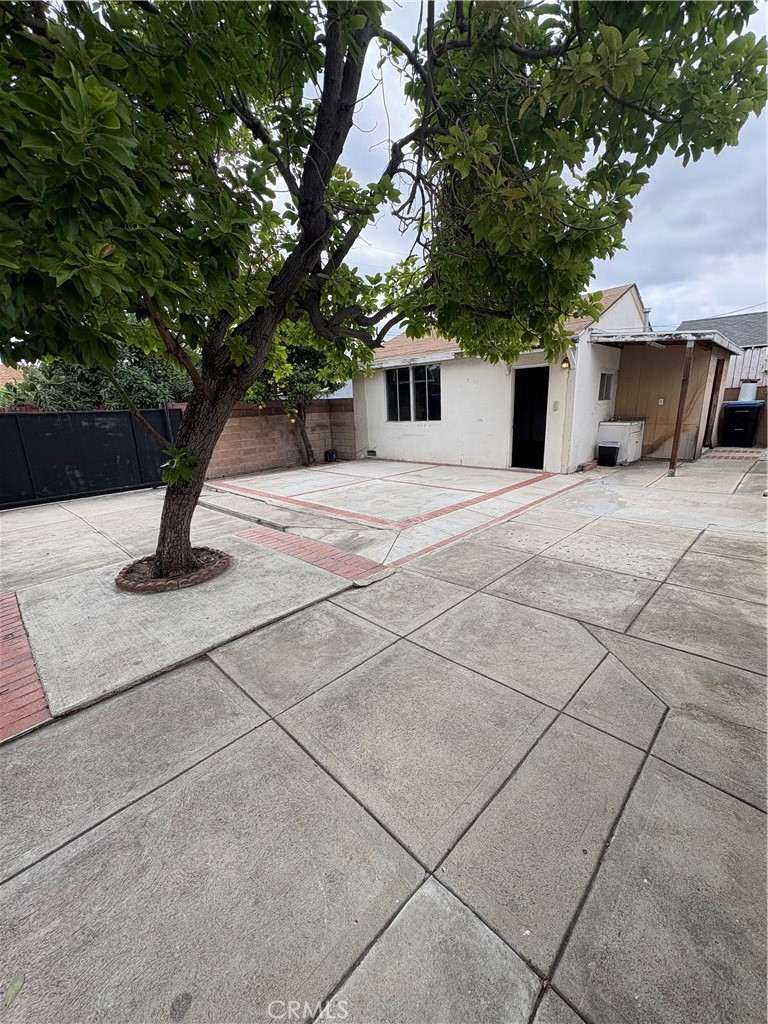 14023 Studebaker Road Norwalk, CA 90650 - Photo 11 of 33 a house with trees in front of it
