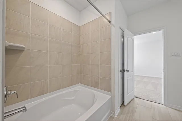 a bathroom with a bathtub