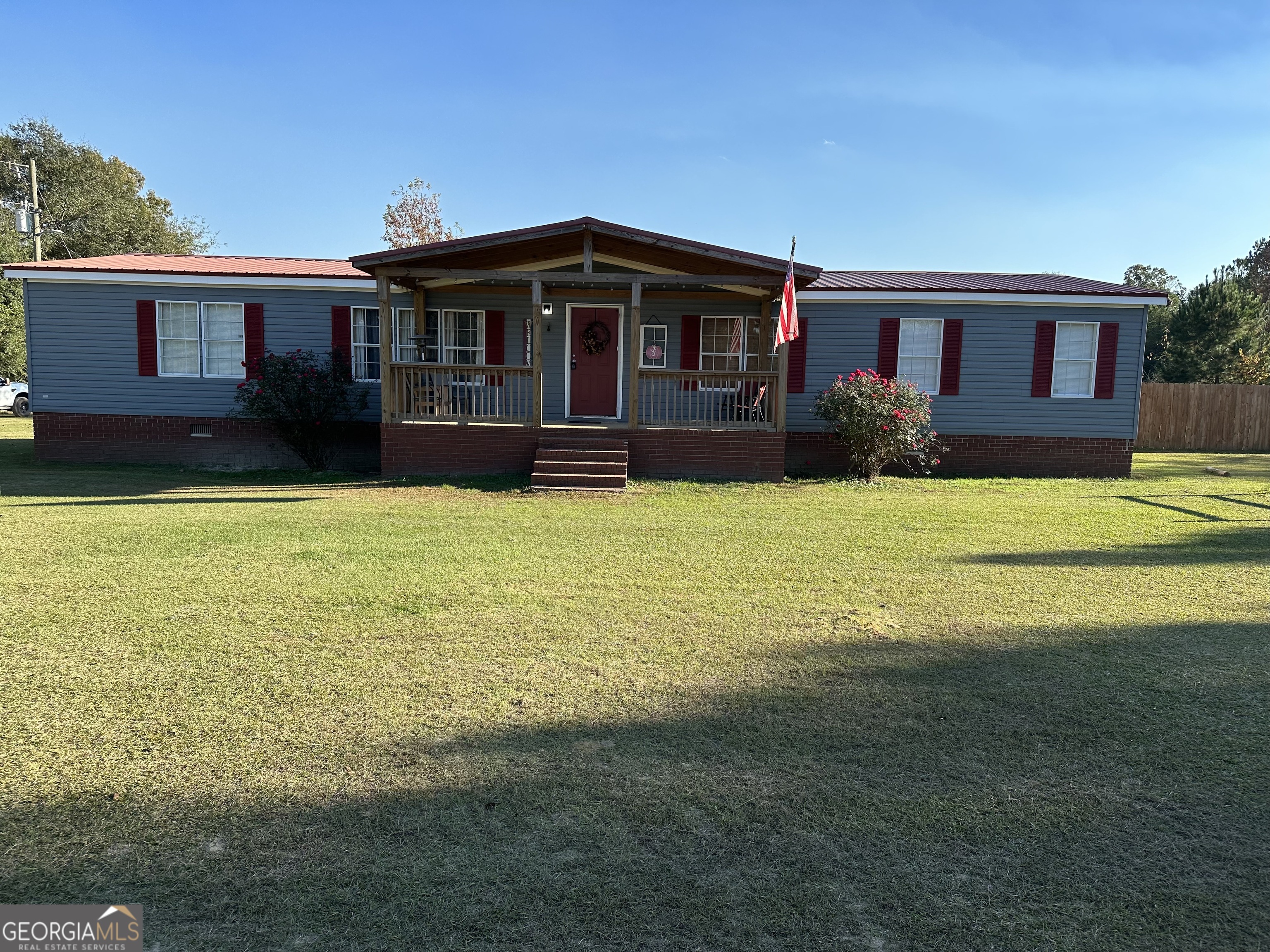 3580 Eley Road Gibson, GA 30810 - Photo 1 of 1 a view of house with yard and swimming pool