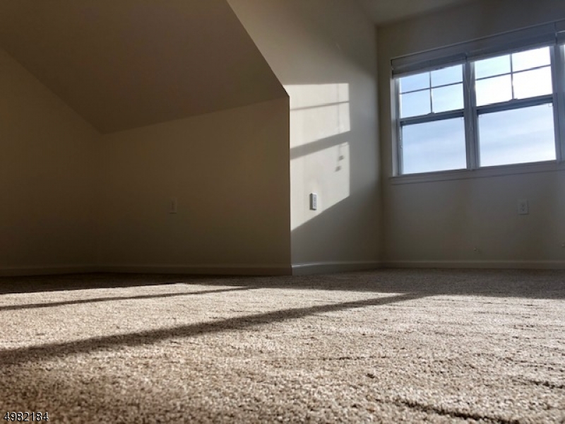 60 Passaic Avenue, Unit 22 Fairfield, NJ 07004 - Photo 11 of 13 a view of wooden floor