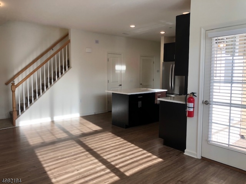 60 Passaic Avenue, Unit 22 Fairfield, NJ 07004 - Photo 13 of 13 a view of a kitchen with utility room and windows
