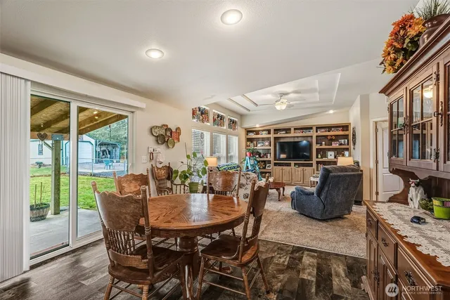 a view of a dining room with furniture window and outside view