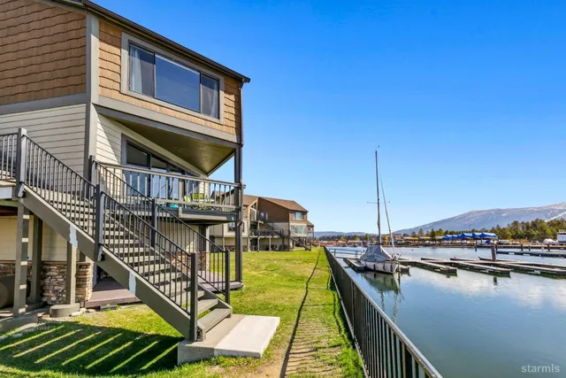 a view of houses with swimming pool