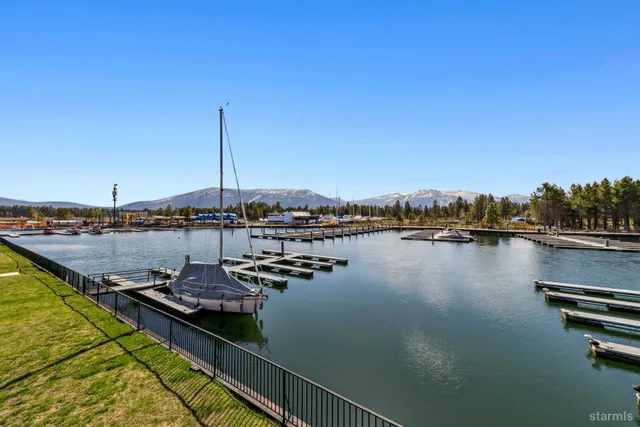 a view of a lake with boats in a lake