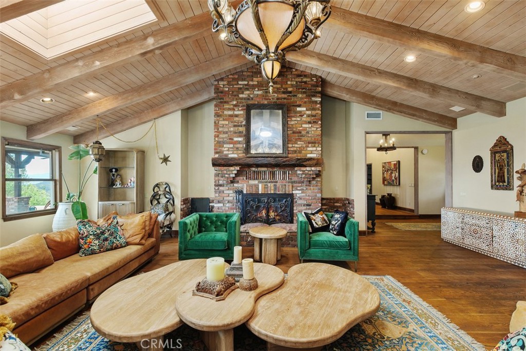27777 Sycamore Mesa Road Temecula, CA 92590 - Photo 21 of 72 Family room with rich wood flooring