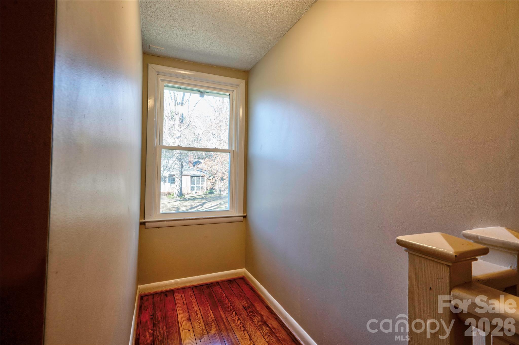 171 Center Street Spindale, NC 28160 - Photo 31 of 34 a view of a room with rack on the wall and a window