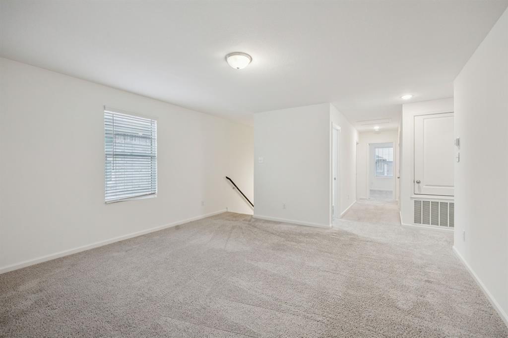 1902 Marquette Road Princeton, TX 75407 - Photo 16 of 30 a view of an empty room with a window