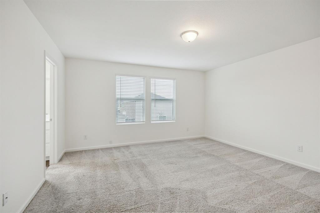 1902 Marquette Road Princeton, TX 75407 - Photo 22 of 30 an empty room with windows