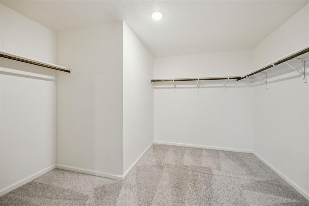 1902 Marquette Road Princeton, TX 75407 - Photo 27 of 30 a view of an empty walk in closet
