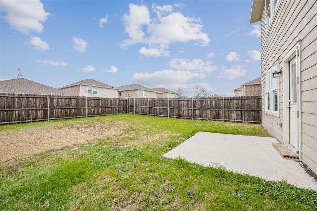1902 Marquette Road Princeton, TX 75407 - Photo 28 of 30 a view of a backyard with a garden