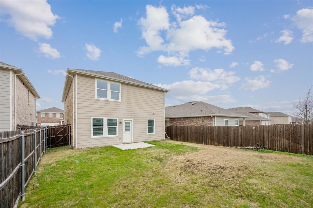 1902 Marquette Road Princeton, TX 75407 - Photo 30 of 30 a front view of a house with a yard