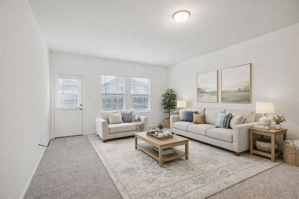1902 Marquette Road Princeton, TX 75407 - Photo 10 of 30 a living room with furniture and a large window