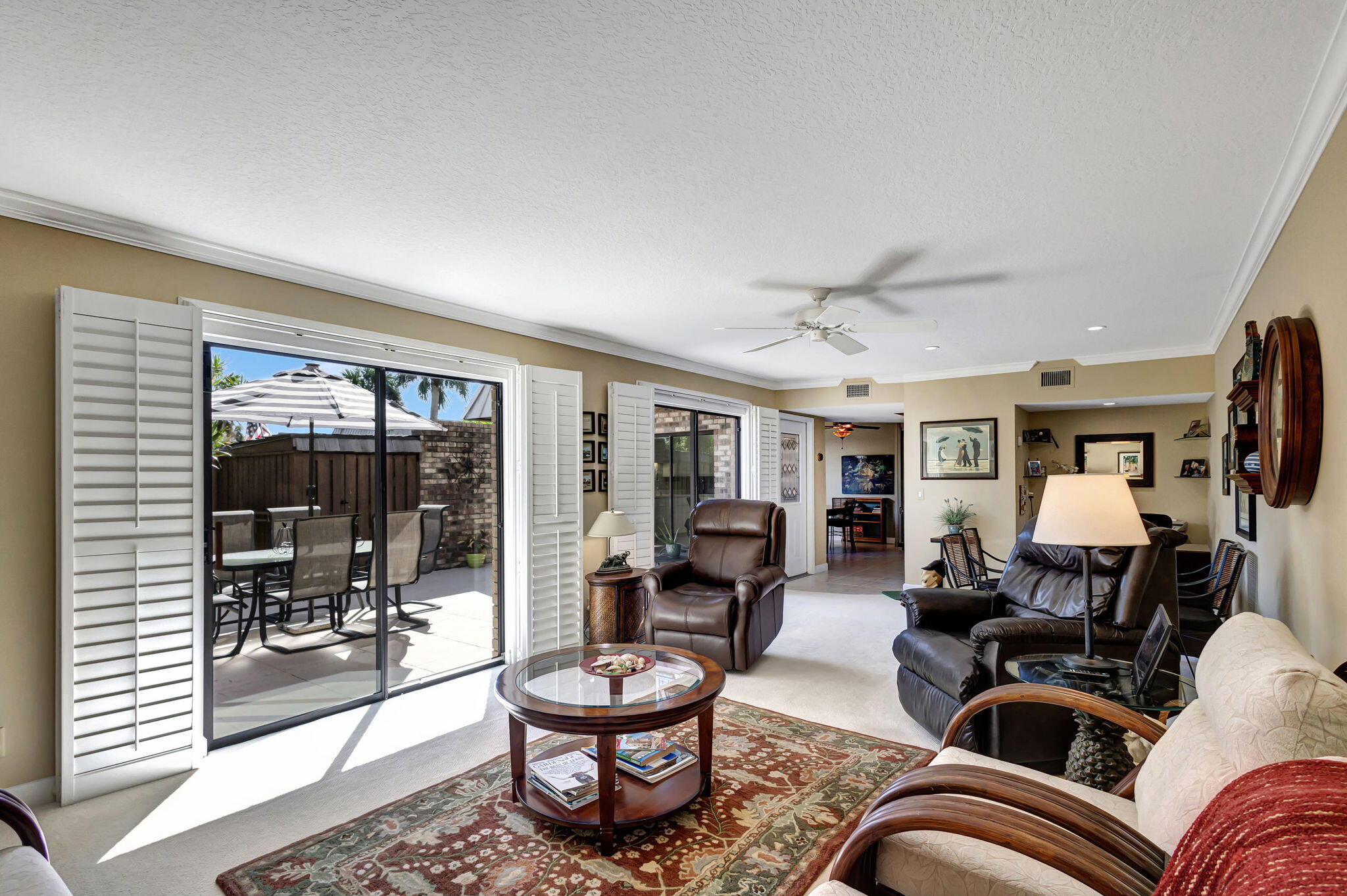 1420 Ocean Way, Unit 23B Jupiter, FL 33477 - Photo 14 of 29 a living room with furniture and a window