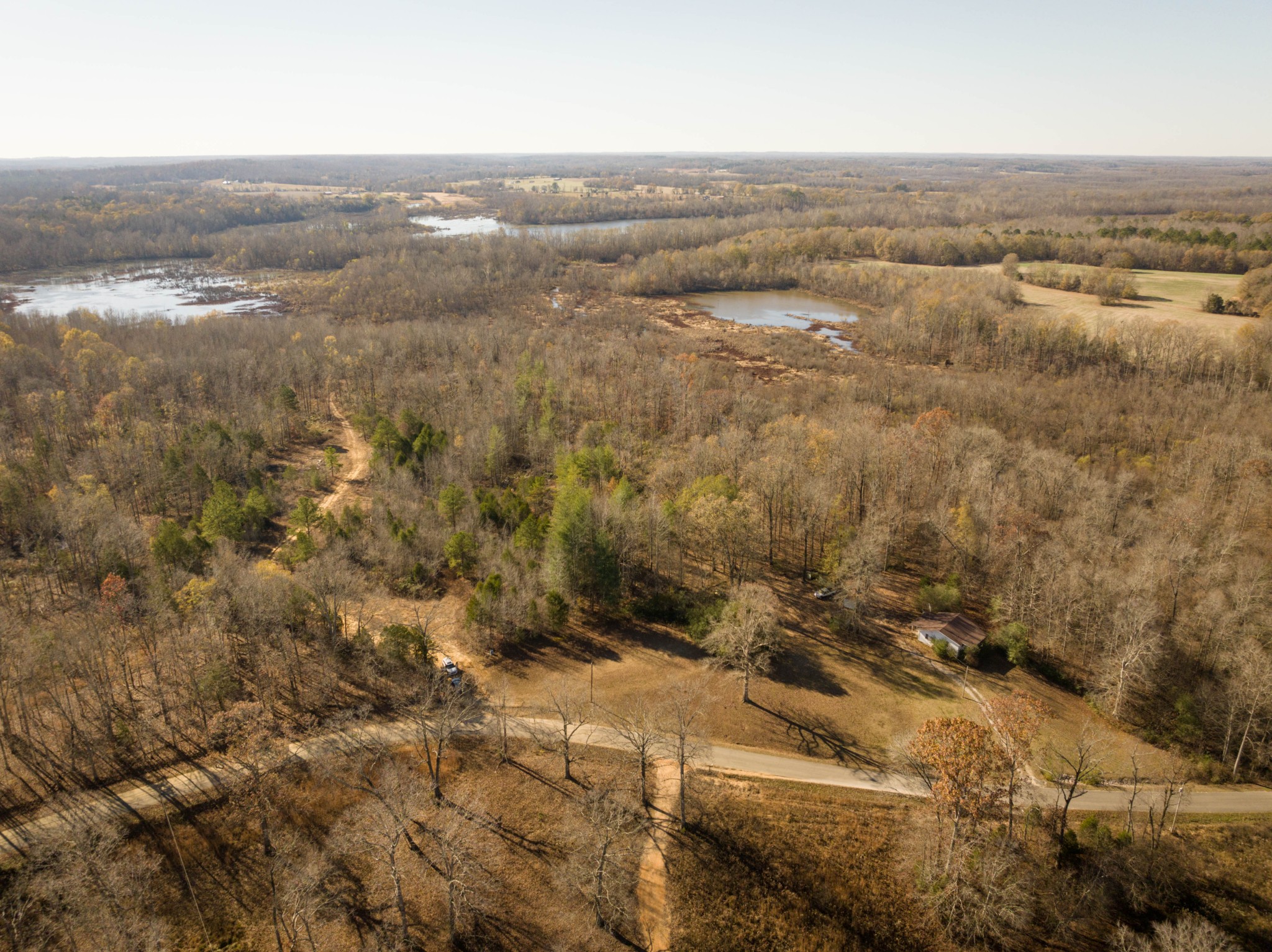 0 Tomlin Chapel Road Parsons, TN 38363 - Photo 10 of 12 an aerial view of residential houses with outdoor space