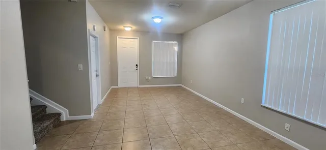 a view of entryway with bathroom