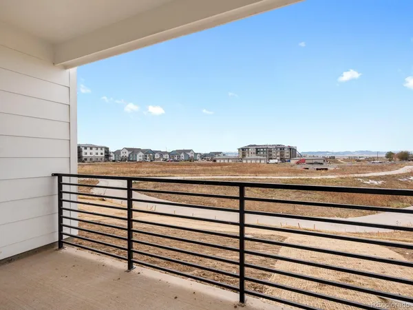 a view of a terrace with a city view