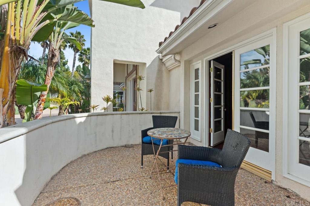6773 Poco Lago Rancho Santa Fe, CA 92067 - Photo 19 of 65 a living room with furniture and a window