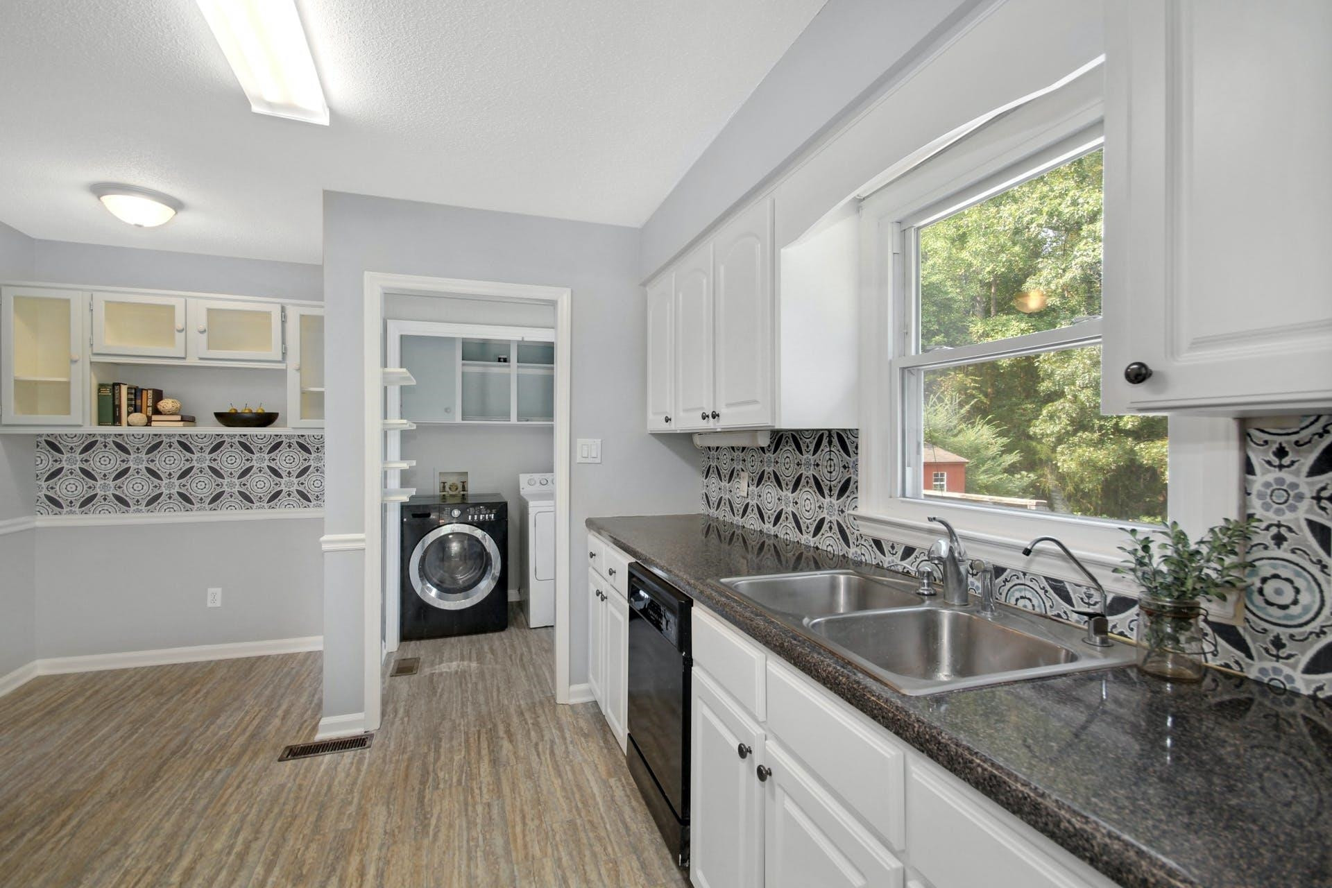 3609 Mitchell Mill Road Raleigh, NC 27616 - Photo 12 of 23 Eat-in kitchen area and laundry room in kitchen