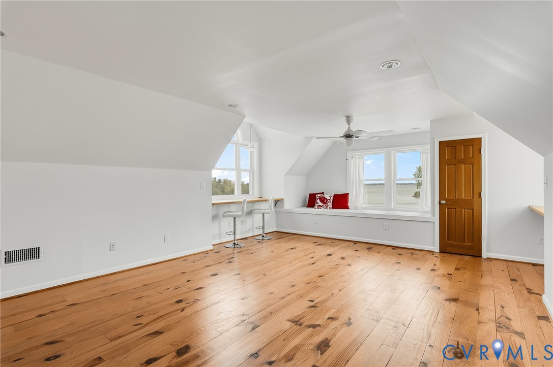 1667 Locust Grove Road Topping, VA 23169 - Photo 27 of 45 Bonus room featuring light wood-style floors, loft