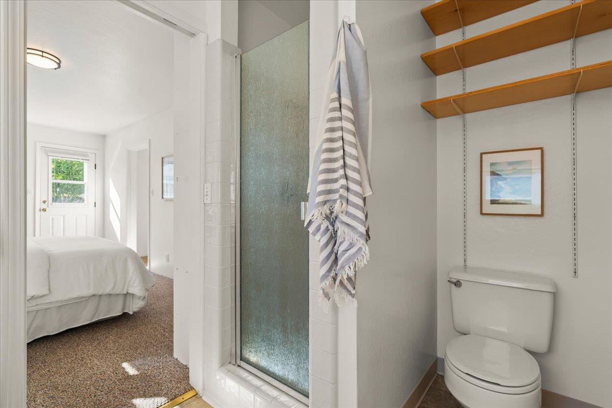 207 2nd Avenue Santa Cruz, CA 95062 - Photo 20 of 38 a bathroom with a toilet and a shower