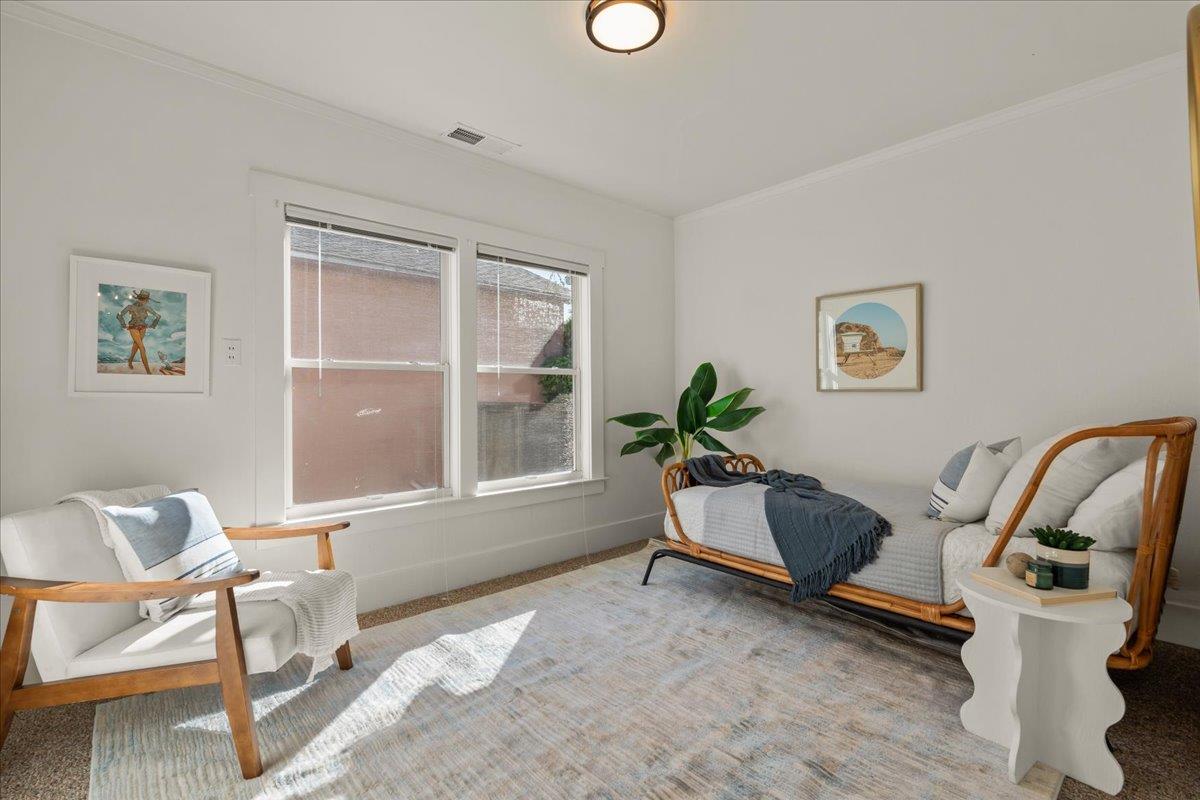 207 2nd Avenue Santa Cruz, CA 95062 - Photo 23 of 38 a living room with furniture and a window