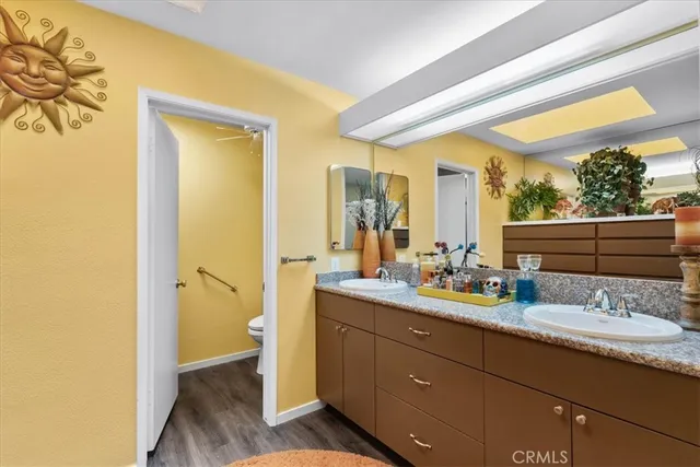 a bedroom with a bed and a chair