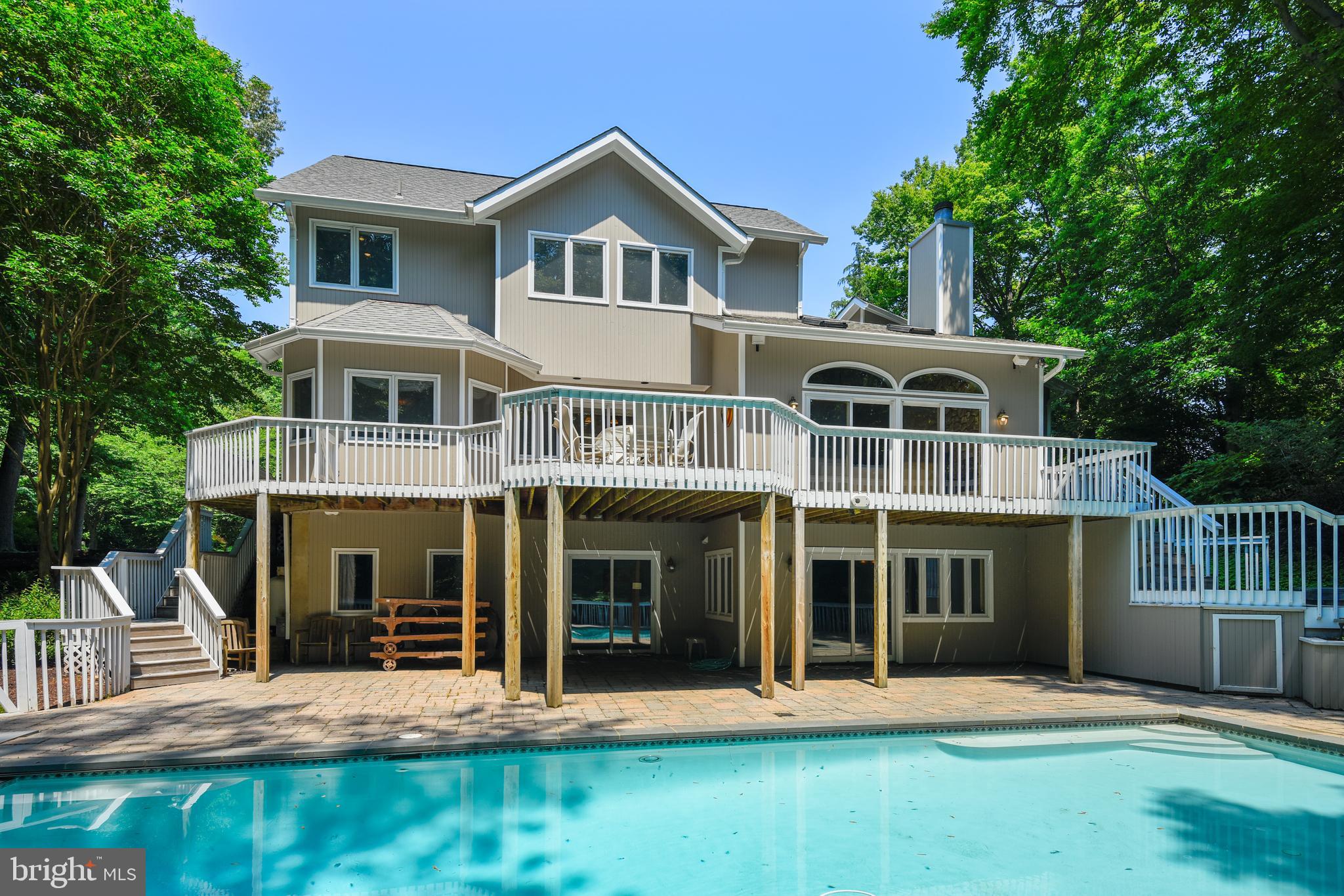 BACK OF HOME SHOWING THE  GUNITE POOL