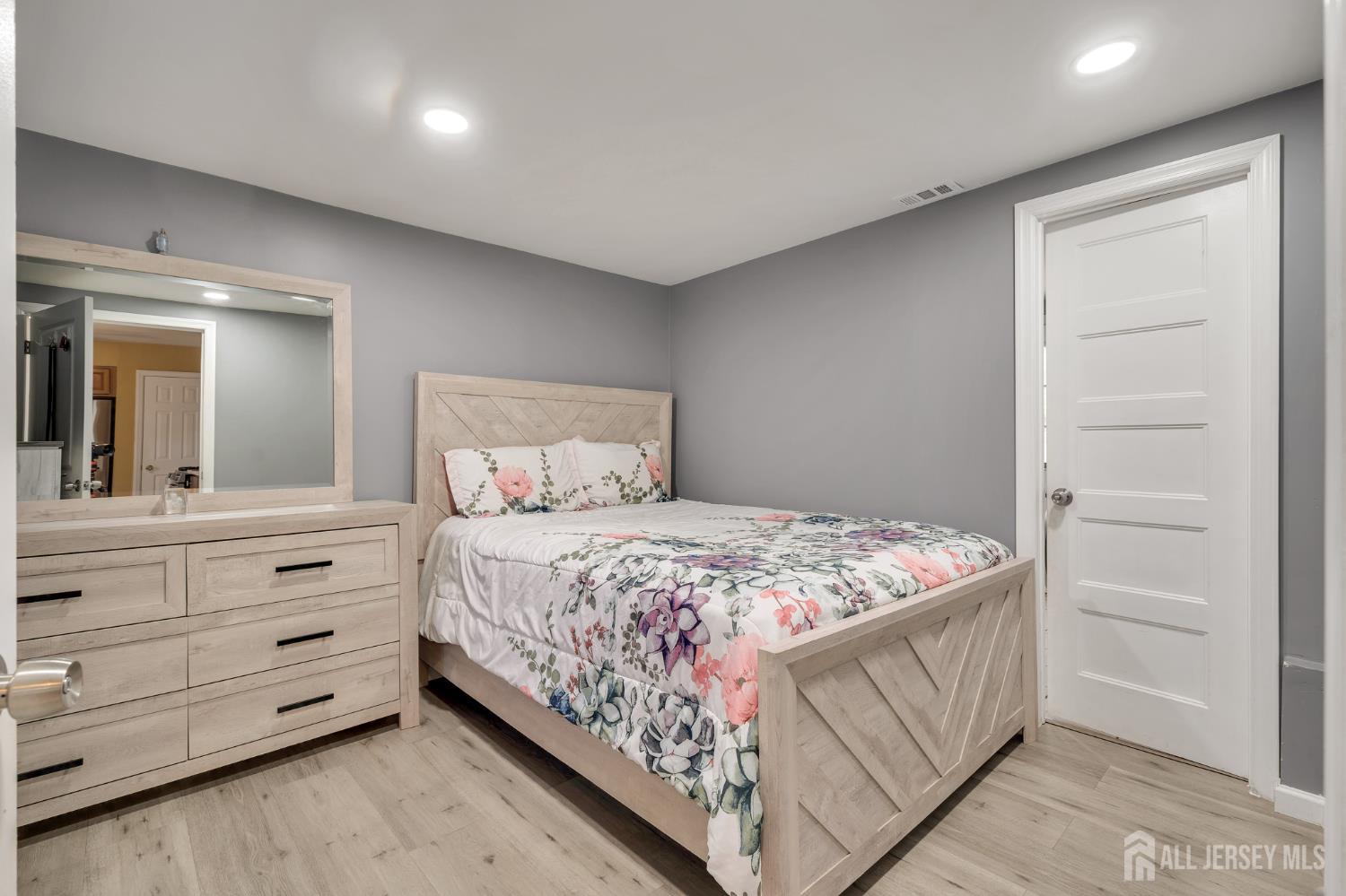 12 Pierrepont Avenue Middlesex, NJ 08846 - Photo 11 of 30 a bedroom with a bed and a dresser