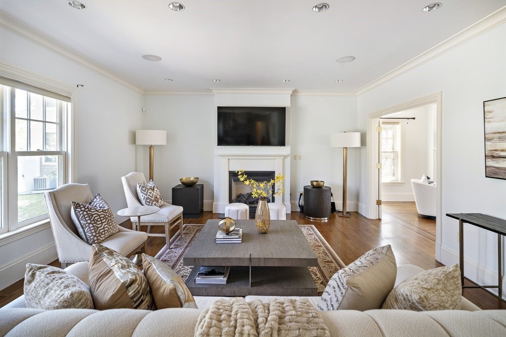 17 Kesseler Way Newton, MA 02467 - Photo 11 of 33 a living room with furniture and a flat screen tv